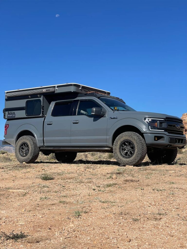 2019 Ford F150 FX4 with FOX 2.5 DSC coilovers all around, Deaver M44 XHD rear leaf pack, Dirt king upper control arms and Dirt king rear shackles