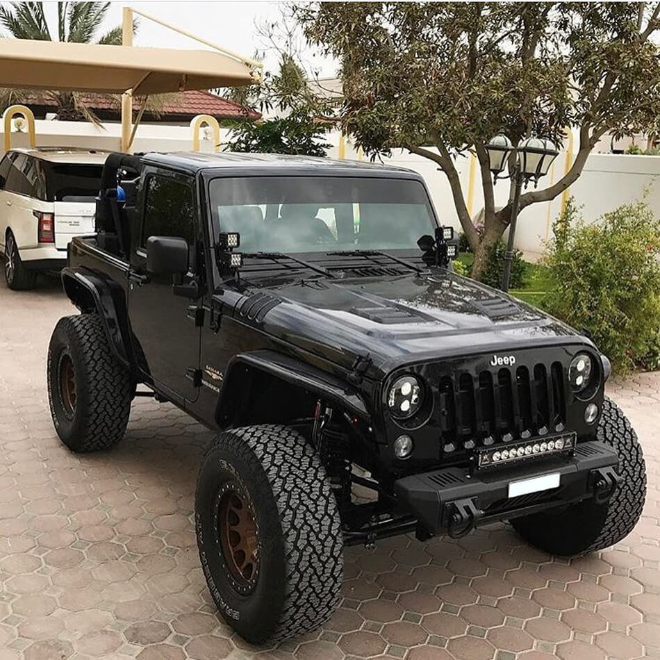 All terrain tires in sand on jeep wrangler