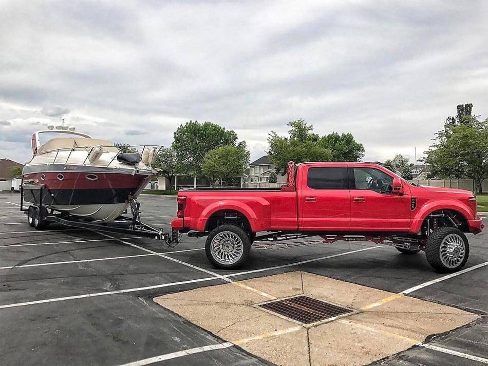 Towing a boat with a lifted truck