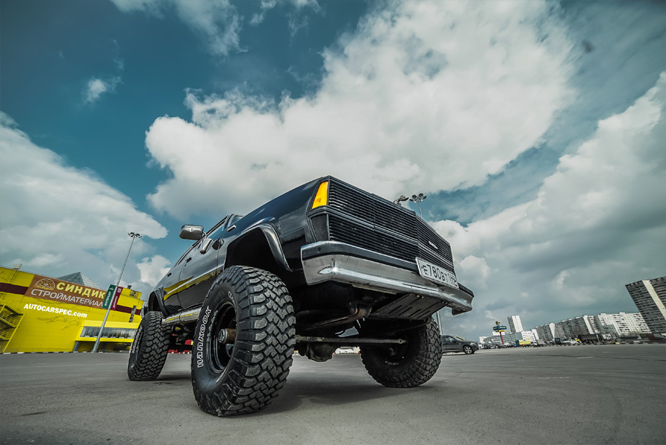 Lifted Chevy Malibu sedan on off-road wheels