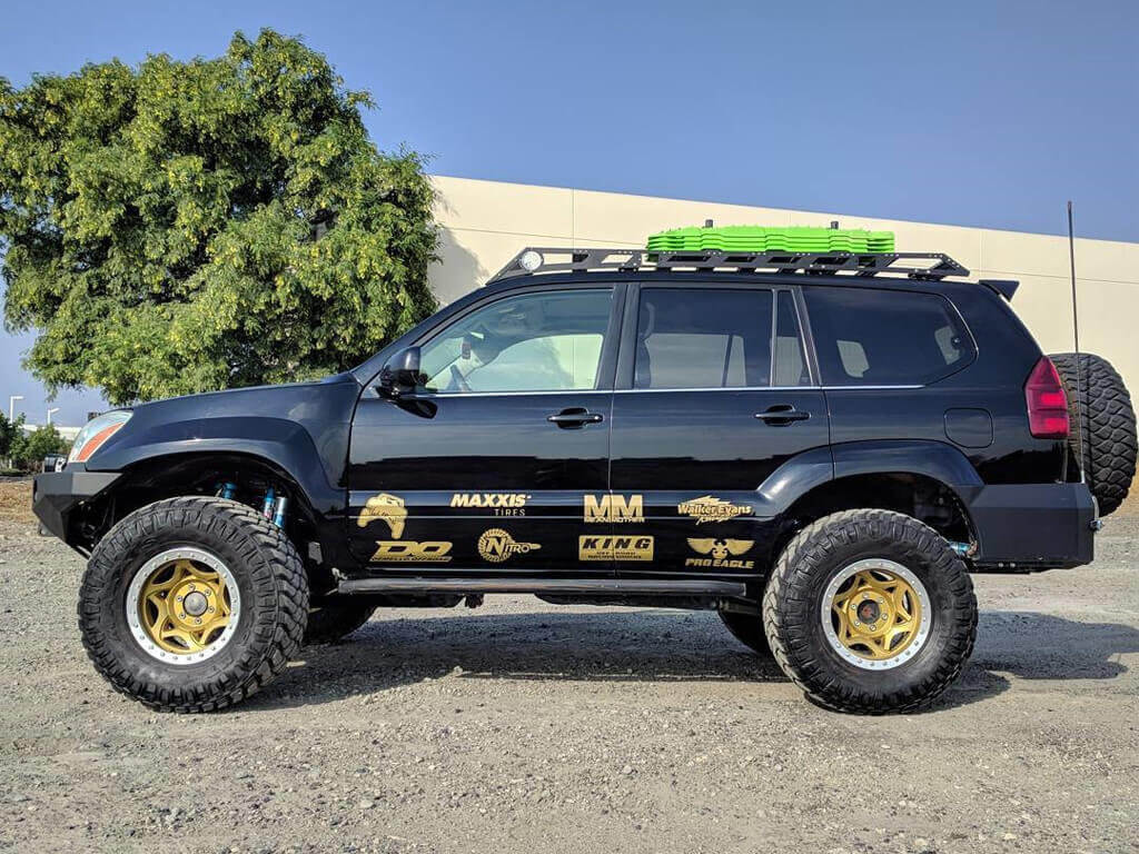 Lifted Lexus GX470 off-road build with 5-7" lift and Expedition Roof rack and Demello Off-Road 4th Gen 4Runner Hybrid Sliders fitted on the GX