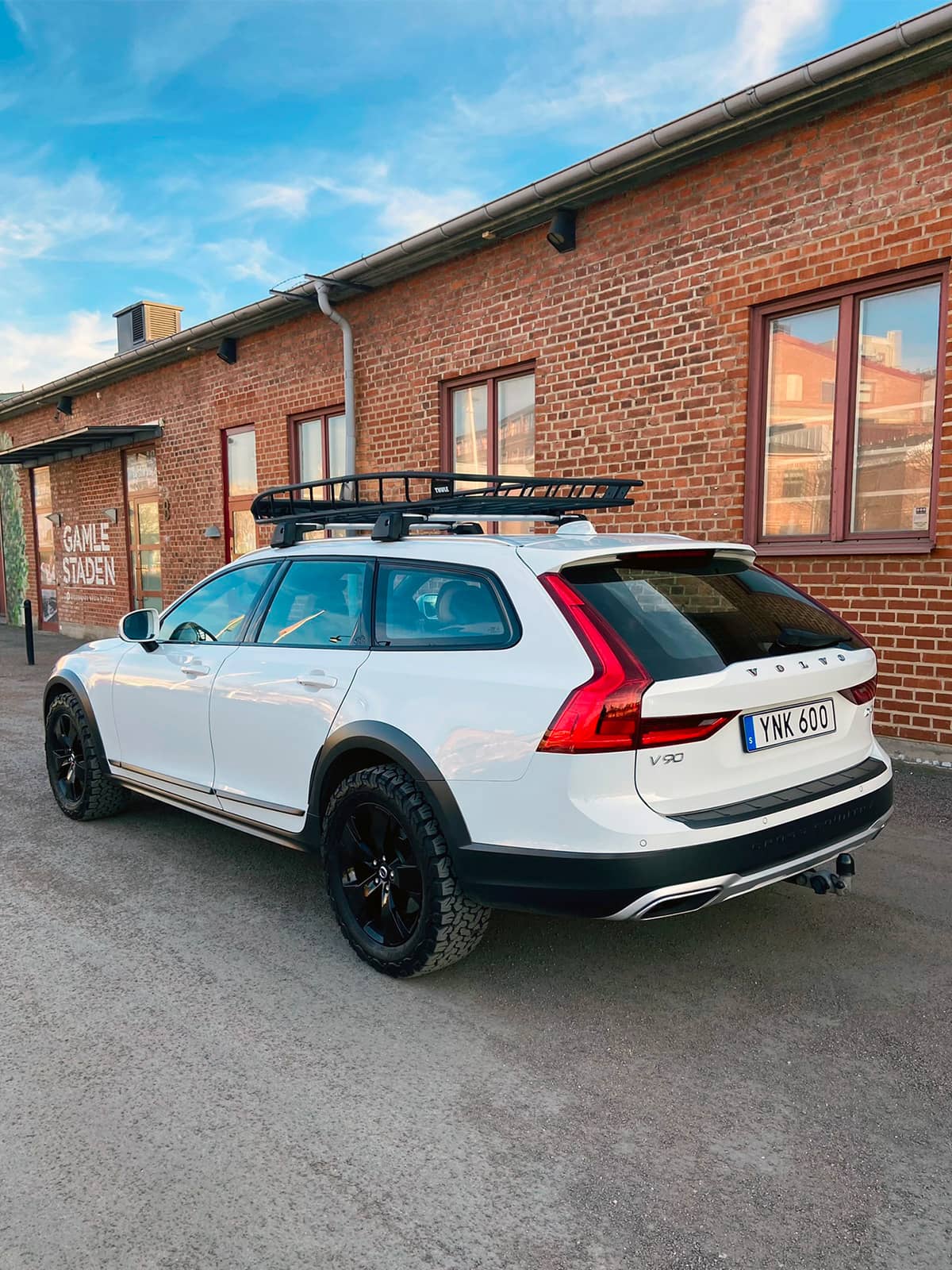 White Volvo V90 Cross Country with black wheels