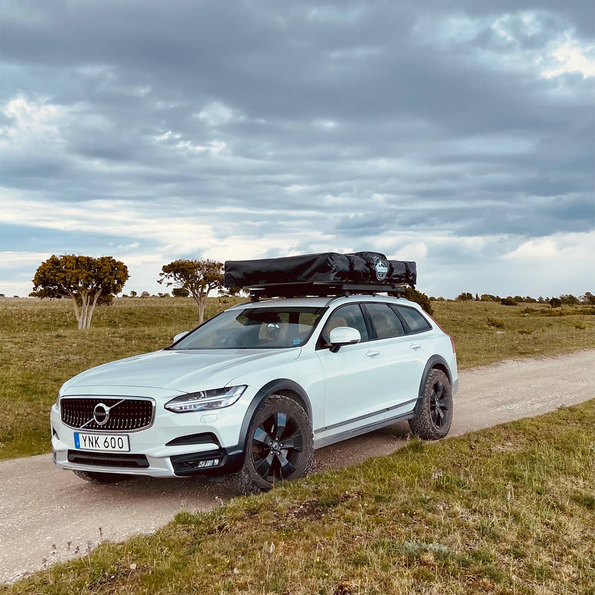 Lifted Volvo V90 Cross COuntry station wagon with off-road modifications and overland roof rack