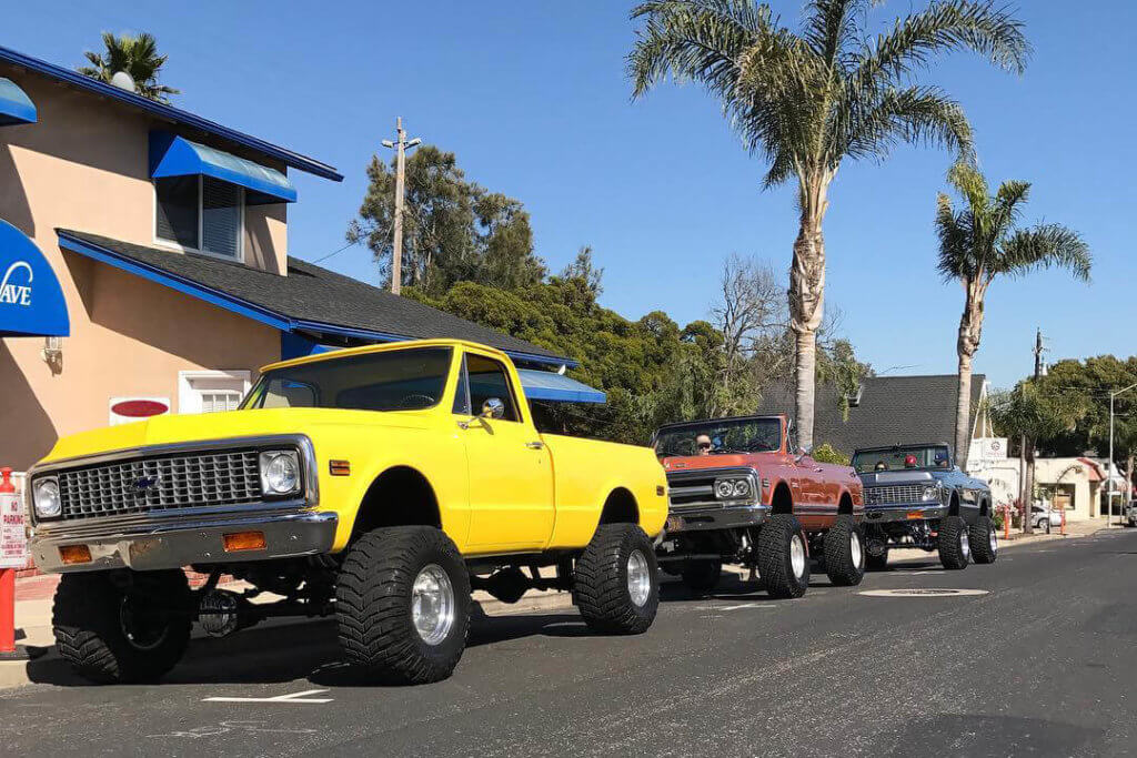 Classic Chevy trucks lifted on big wheels