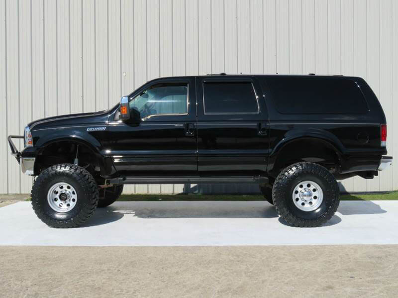 Ford Excursion with a big lift and tires