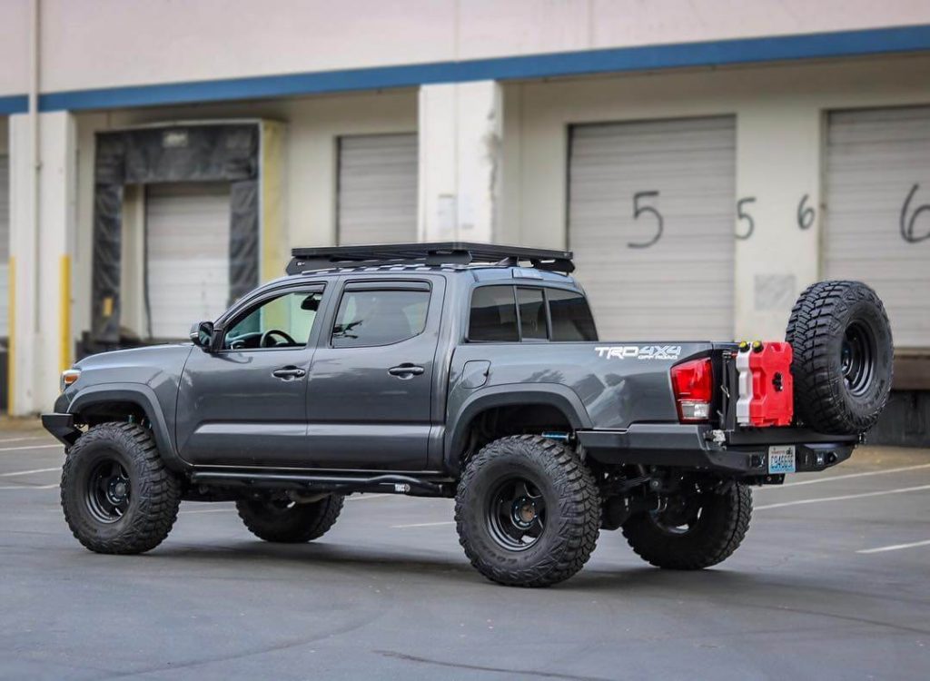 toyota tacoma off road build truck with tailgate mounted spare tire