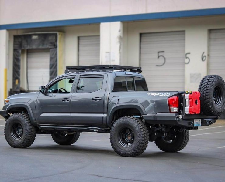 toyota tacoma off road build truck with tailgate mounted spare tire