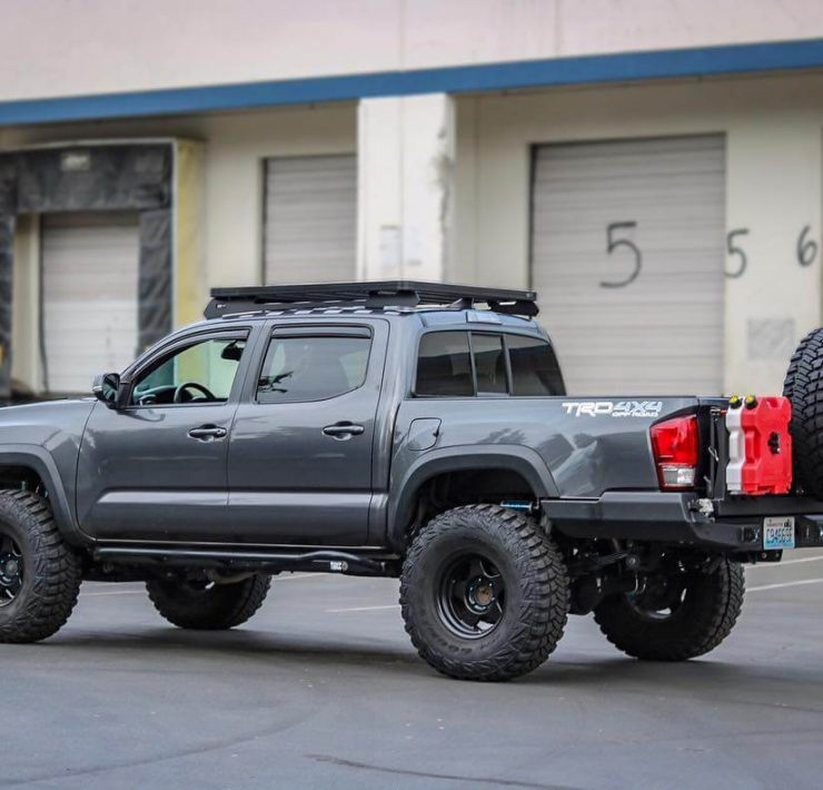 toyota tacoma off road build truck with tailgate mounted spare tire