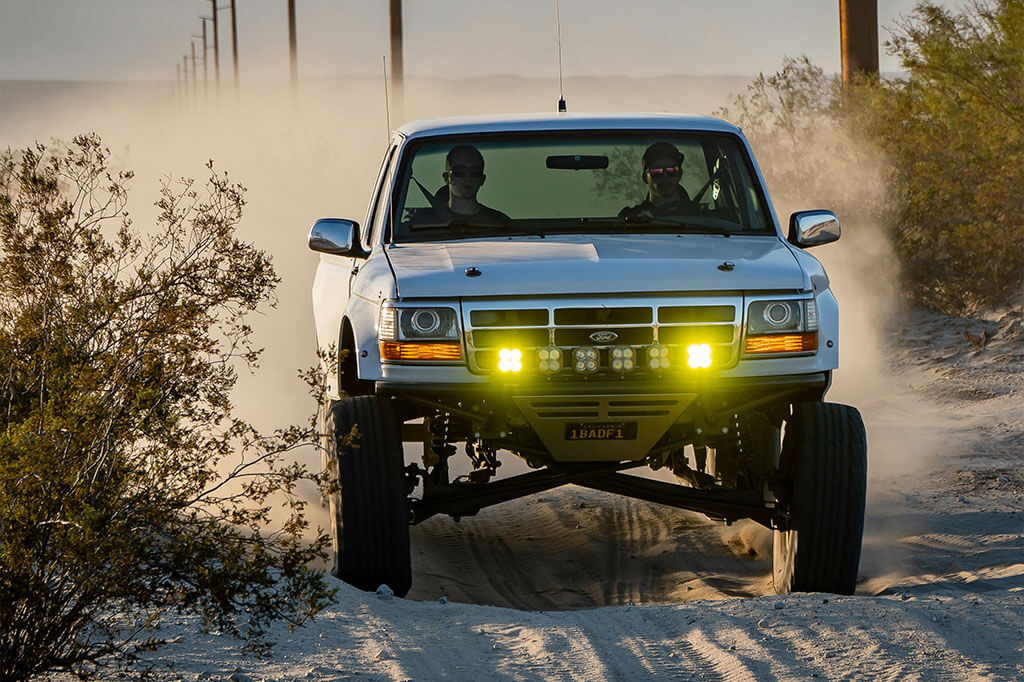 Ford F150 prerunner racing in the desert