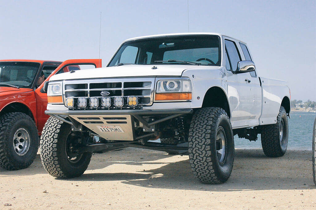 White obs ford F150 pre runner with camburg suspension and fox shocks