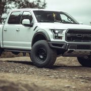 White ford Raptor on Black Off-road wheels