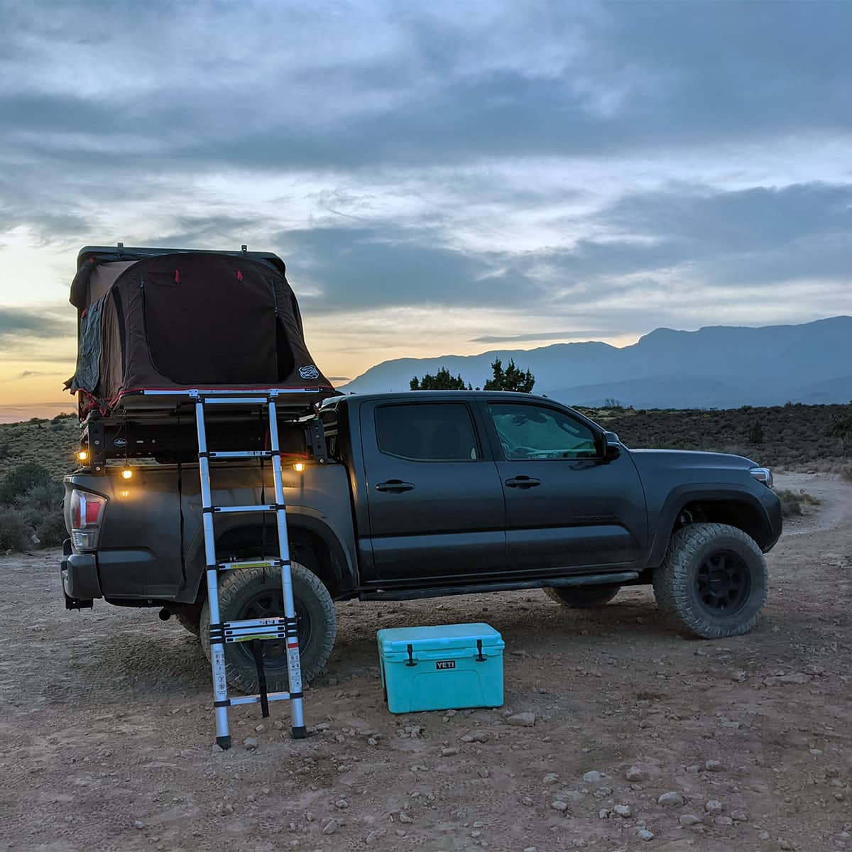 2020 Toyota Tacoma with bed mount roof top tent