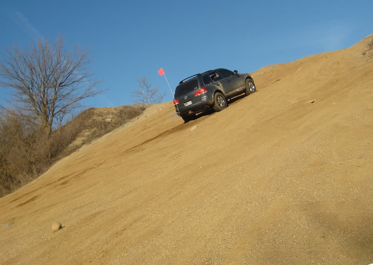 Volkswagen Touareg offroading wheeling in the desert