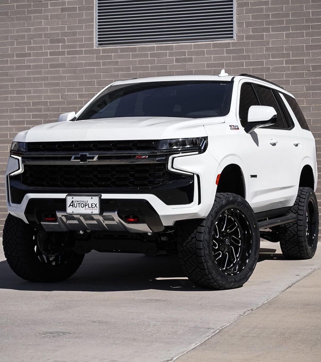 jacked up chevy suburban