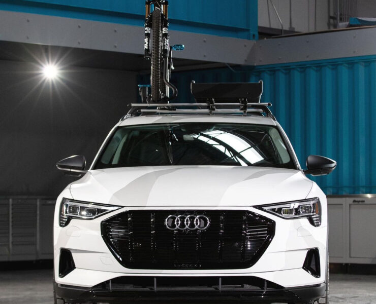 Audi E-tron with a roof rack and basket + Bike carrier