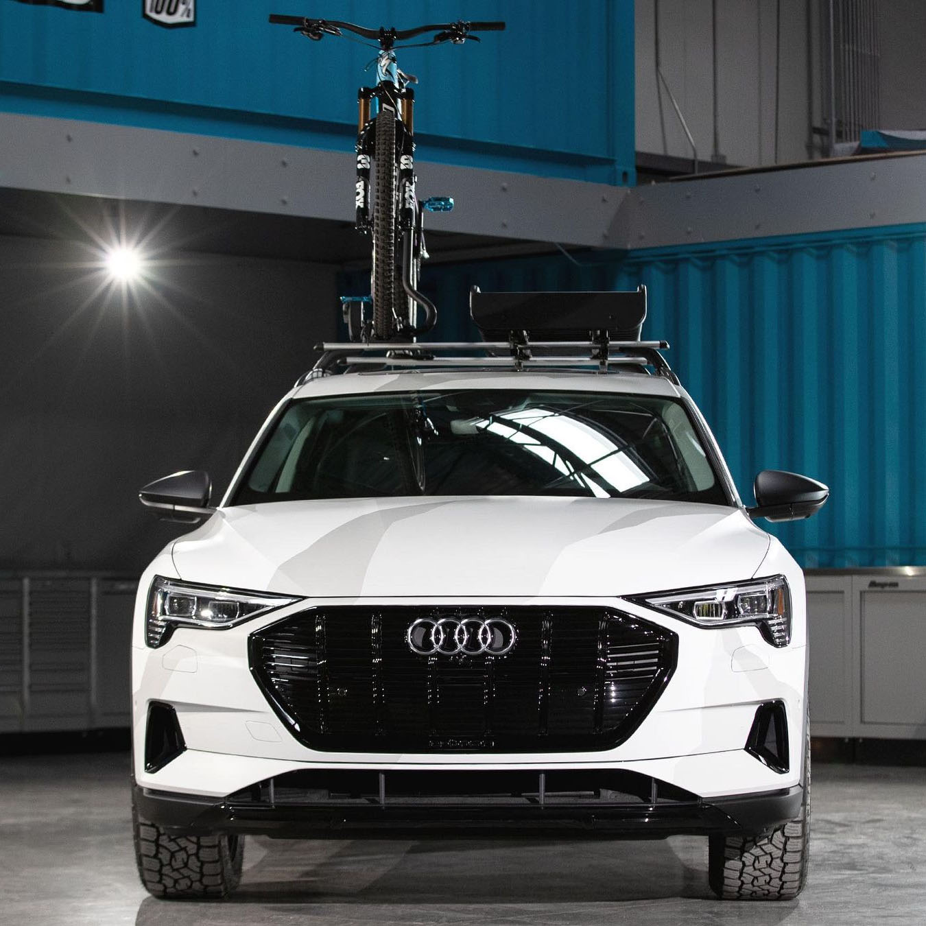 Audi E-tron with a roof rack and basket + Bike carrier