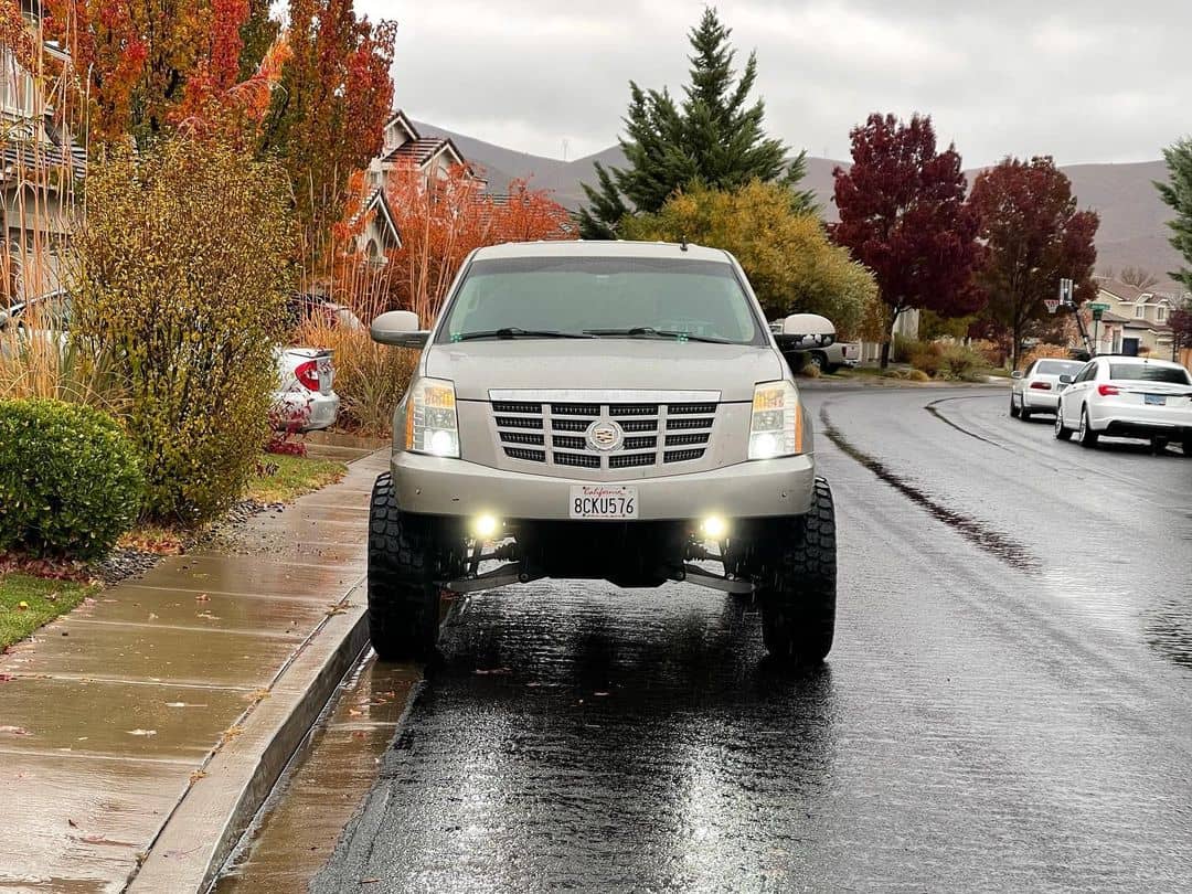 Lifted Cadillac Escalade bumper cut