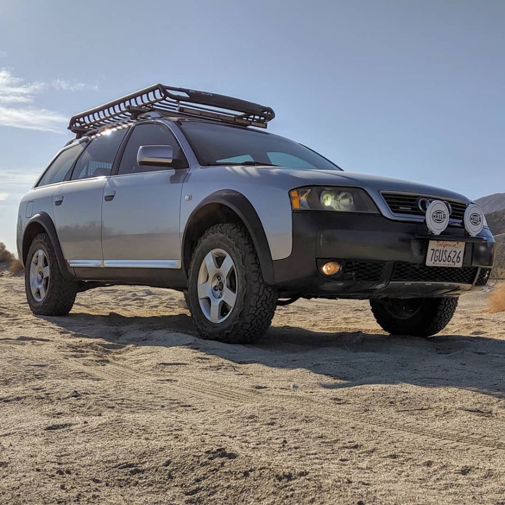 Lifted Audi Allroad C5 with all terrain tires and a roof rack