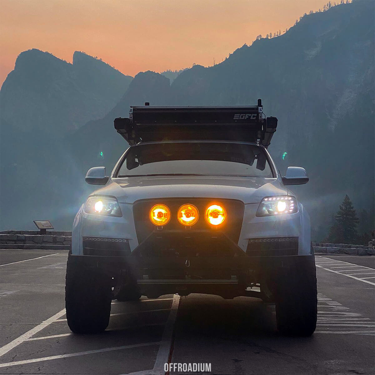 Audi Q7 custom prerunner style offroad bumper with a skid plate and LED lights