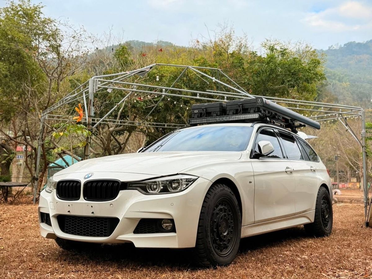 White BMW F31 320i Touring wagon in alpine white showing Black Rhino Arsenal wheels