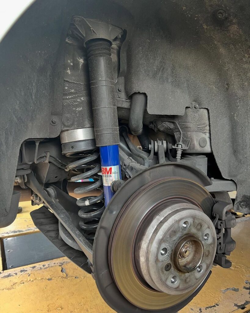 ABM shock absorber installed on the rear suspension of a BMW F31 Touring wagon