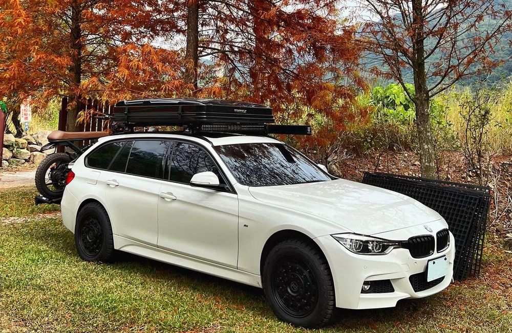 Yakima LockNLoad roof rack with a Timebox hard shell roof top tent mounted on it