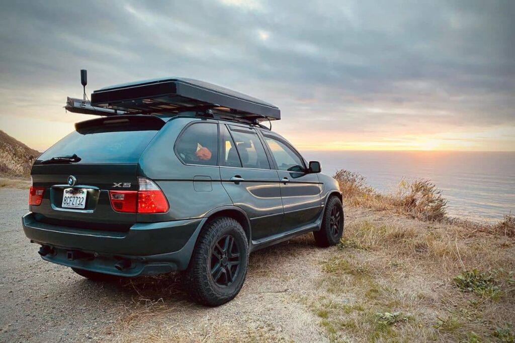 BMW X5 E53 with a roof top tent and roof rack