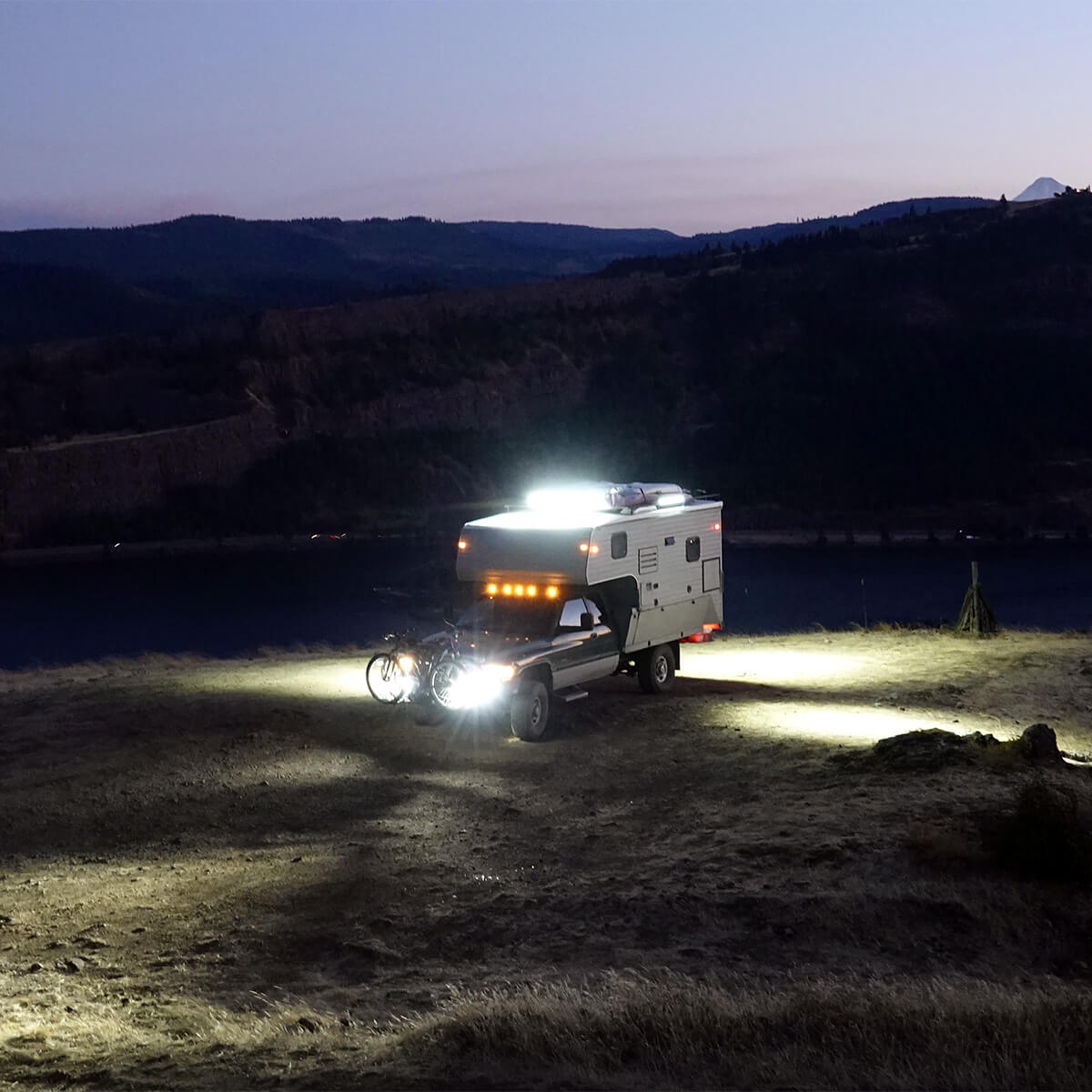 Dodge ram truck with a camper and LED lights