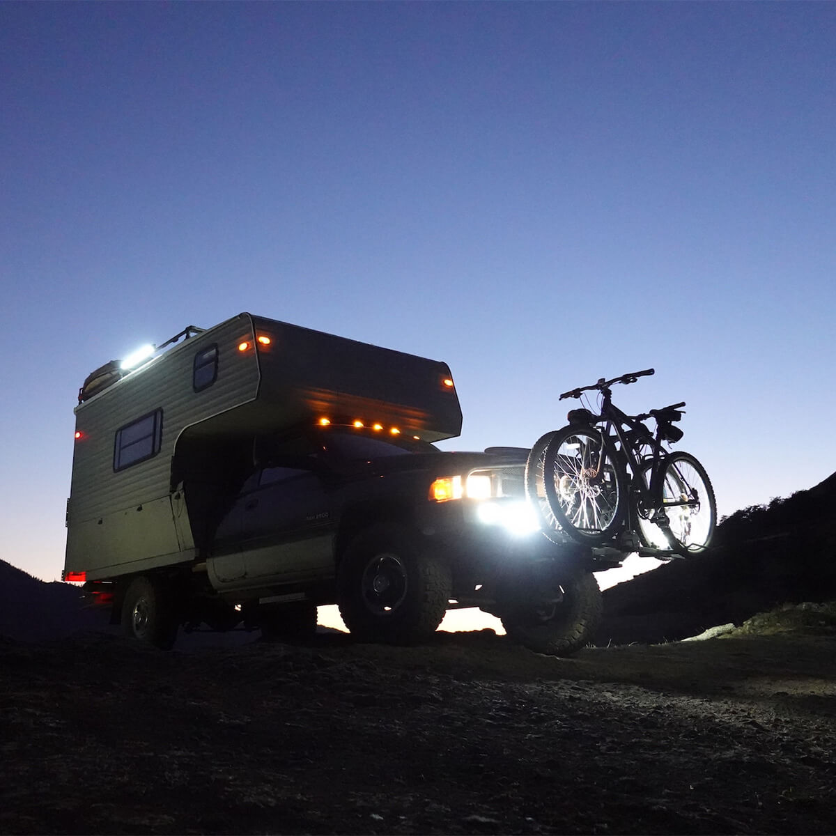 Lifted Dodge Ram truck with an overland camper