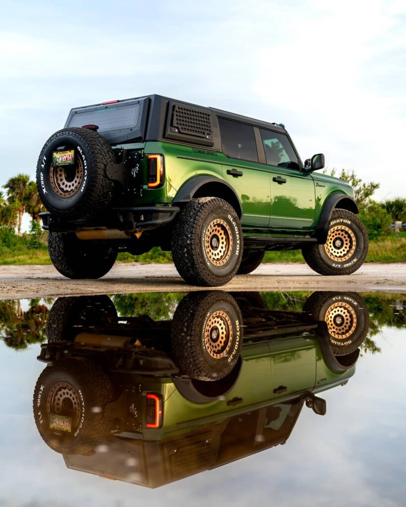 Green Ford Bronco Big Bend on Dobinsons IMS coilovers 3″ lift