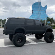 Ford Excursion 10 inch lift and custom suspension modifications