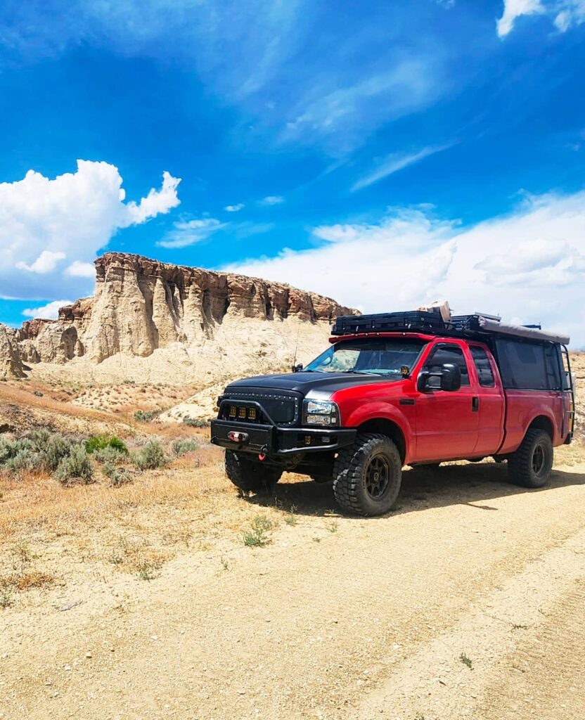 Ford F250 Super duty with a DIY built camer and pop-top