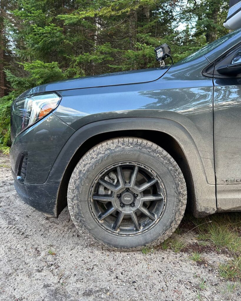 2018 GMC Terrain with a 1.25" lift, 235/65/17 Falken Wildpeak A/T trail and 17″ Voxx Monte Wheels