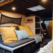 Custom bed and kitchen in a van