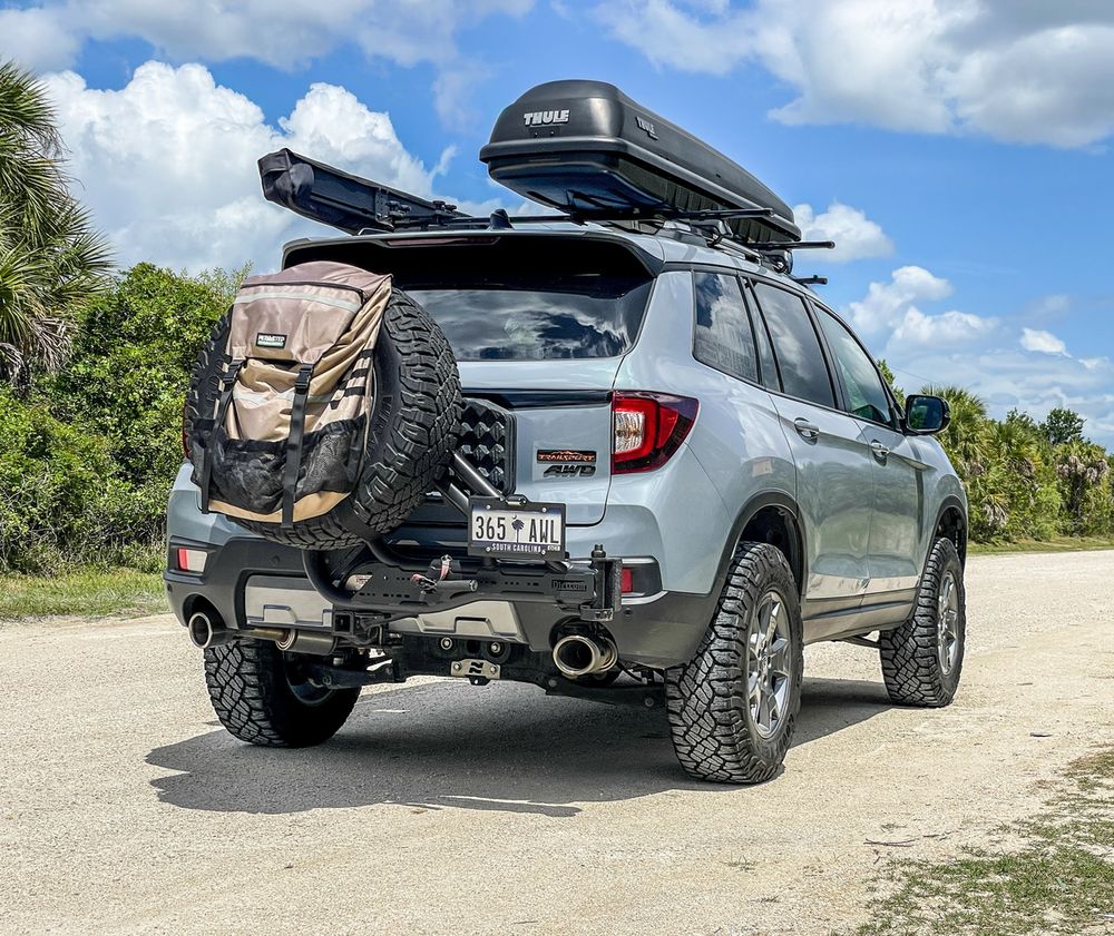 Dirtcomplex Trail Swing Spare Tire Carrier - allows attaching the full size 33" spare tire