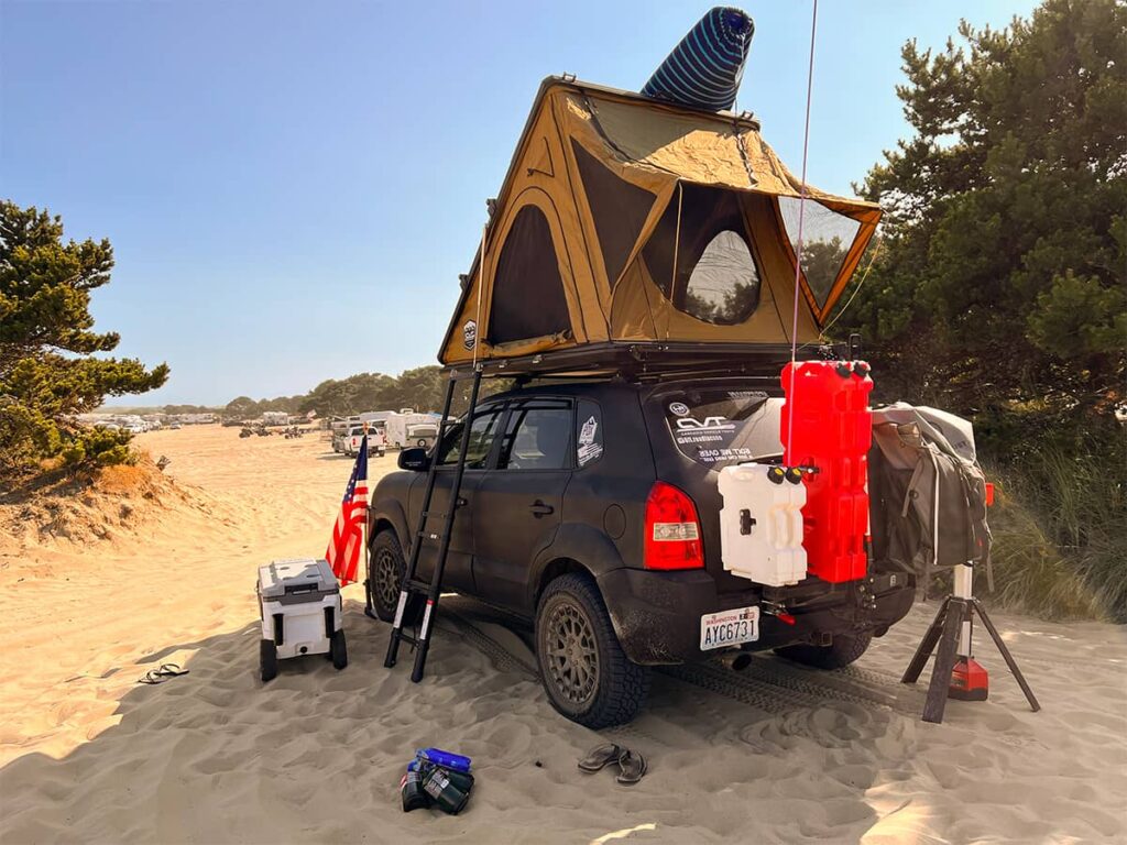 Rear swing out tire carrier, rotopax mounts and overland gear