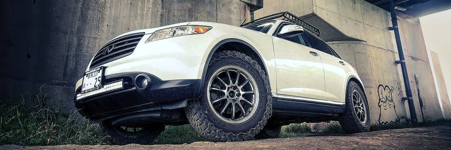 Infiniti off road builds with large tires and suspension lifts