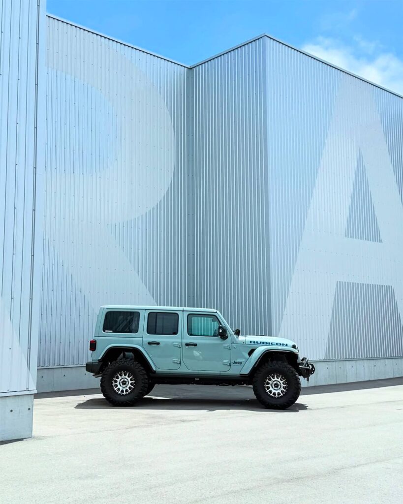 Lifted Jeep Wrangler JL 4xe hybrid in fresh mint color