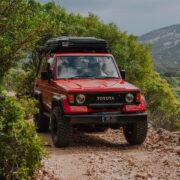 Red Toyota Land Cruiser 70 overlander with winch Escape 9500lbs