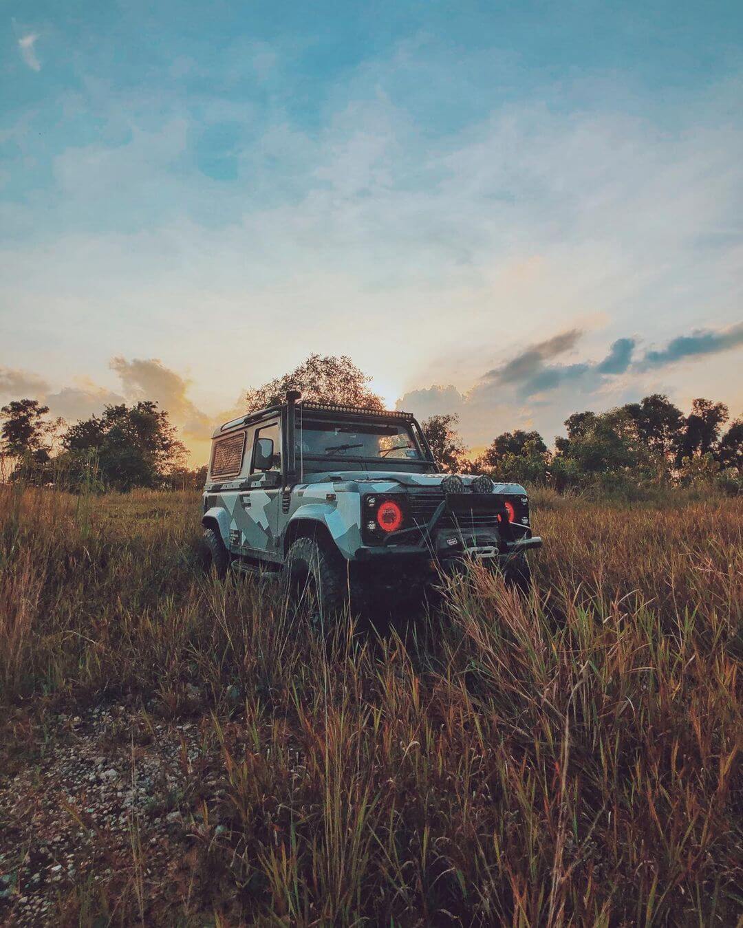 Lifted 2006 Land Rover Defender 90 with overland style modifications