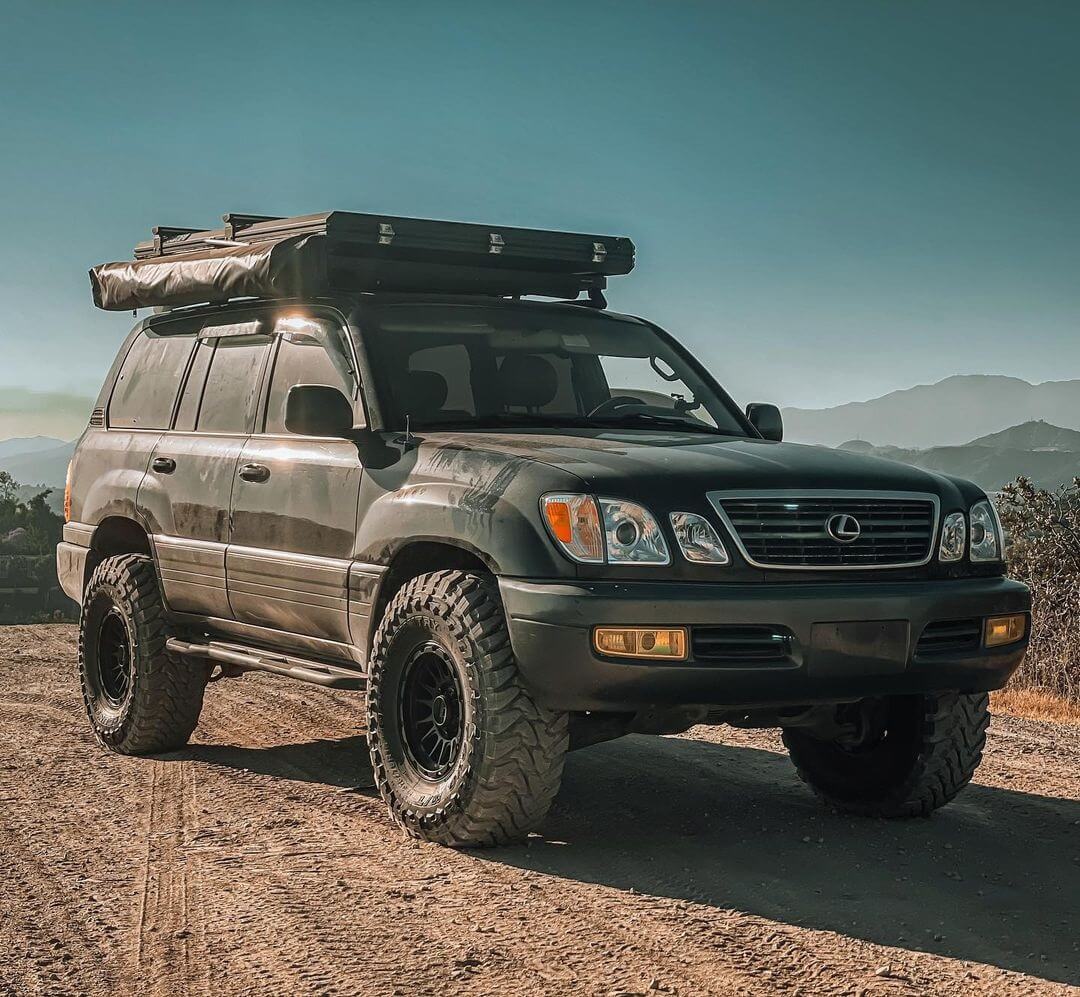 Lifted Lexus LX470 2nd gen off-roading in the desert with Mud tires