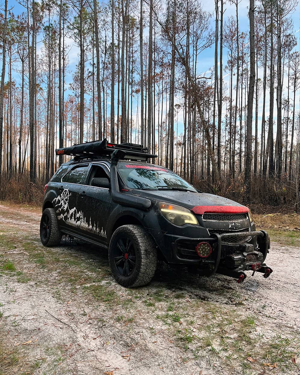Lifted Chevy Equinox Crossover with a front winch