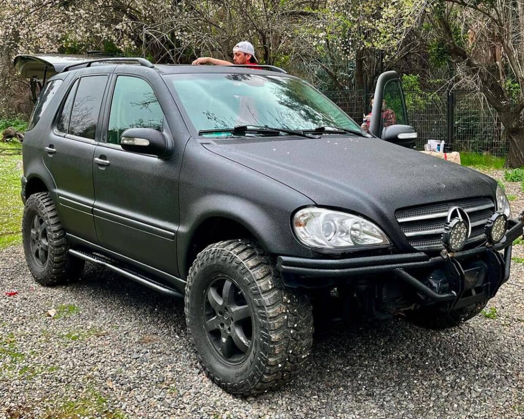 3" lifted Mercedes ML with off road modifications and rock sliders