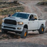 Lifted Dodge Ram 2500 running 2.75" Thuren Fabrication Springs, FOX 2.5 DSC Shocks, Carli Suspension Track Bar