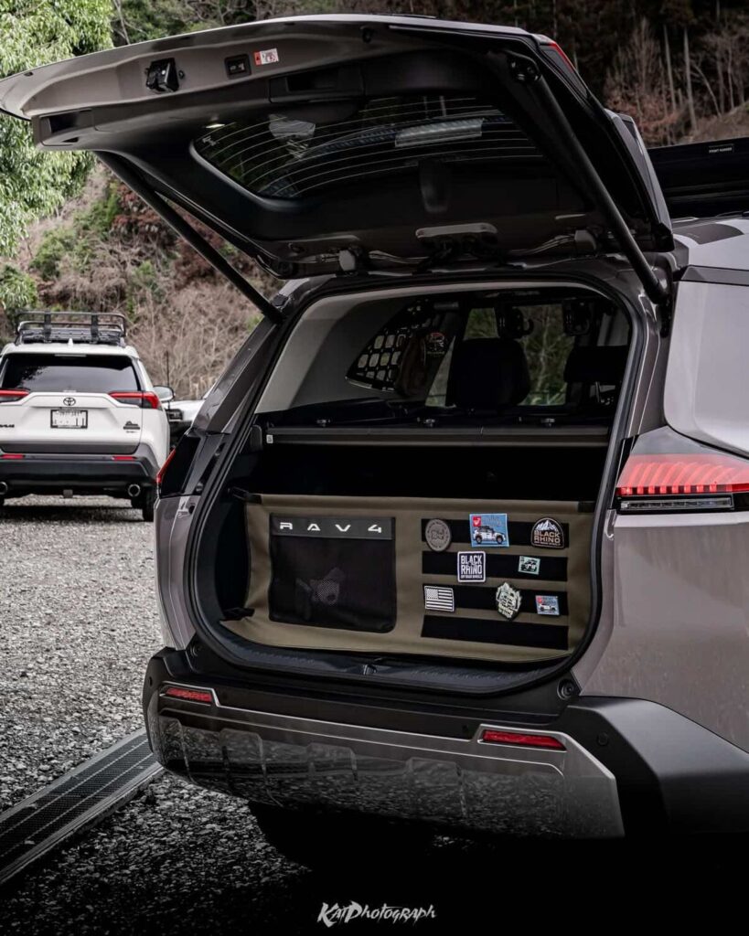 Custom rear cargo storage system with molle panel installed in the 6th gen RAV4