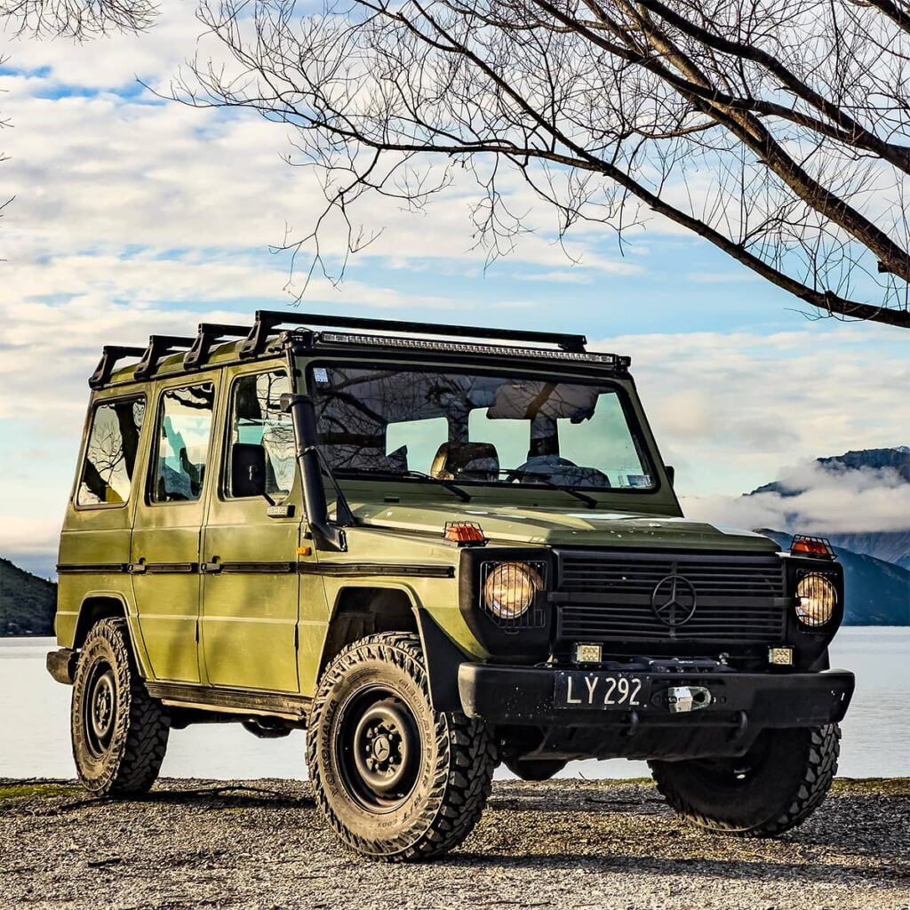 Mercedes W460 280GE in green color with black front end and winch in the bumper