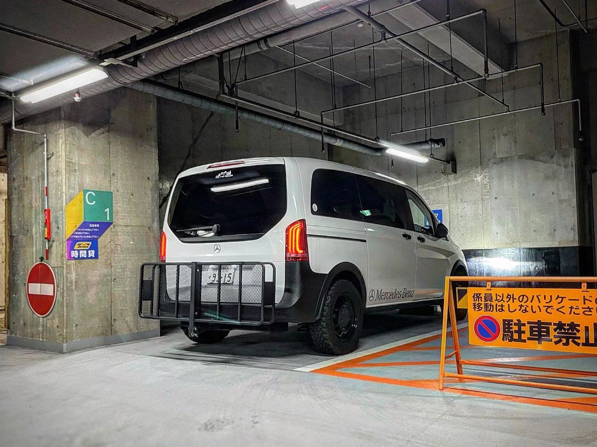 Curt Class 3 hitch receiver visible under the rear of a lifted Mercedes V-Class