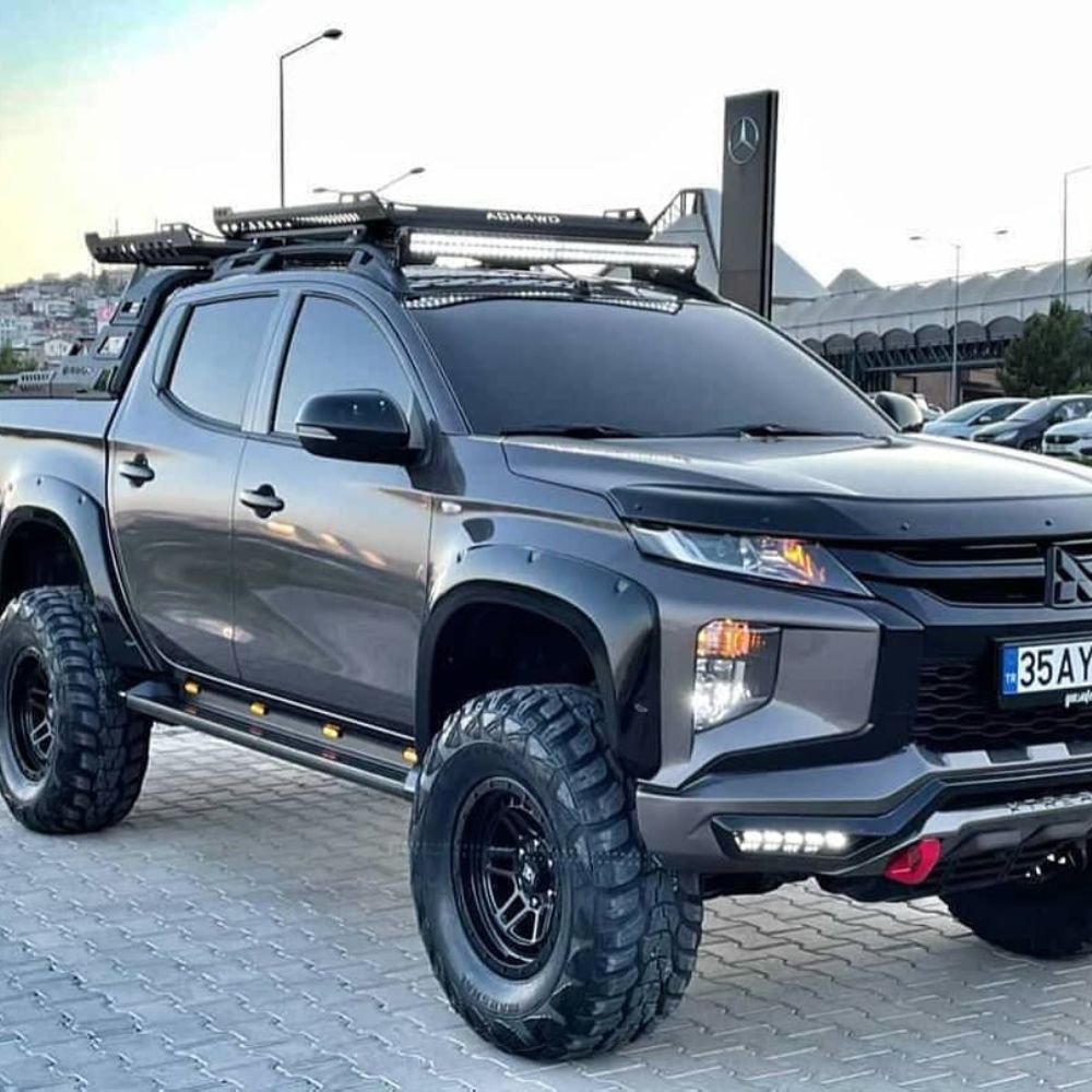 3rd Gen 2020 Mitsubishi L200 by 33" All Terrain Tires, Extremer Integrated Front Winch Bumper, AQM4WD Roof and Bed Rack System