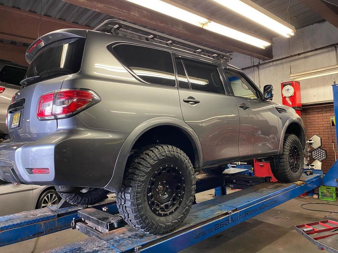 Lifted infiniti QX80 off-roading