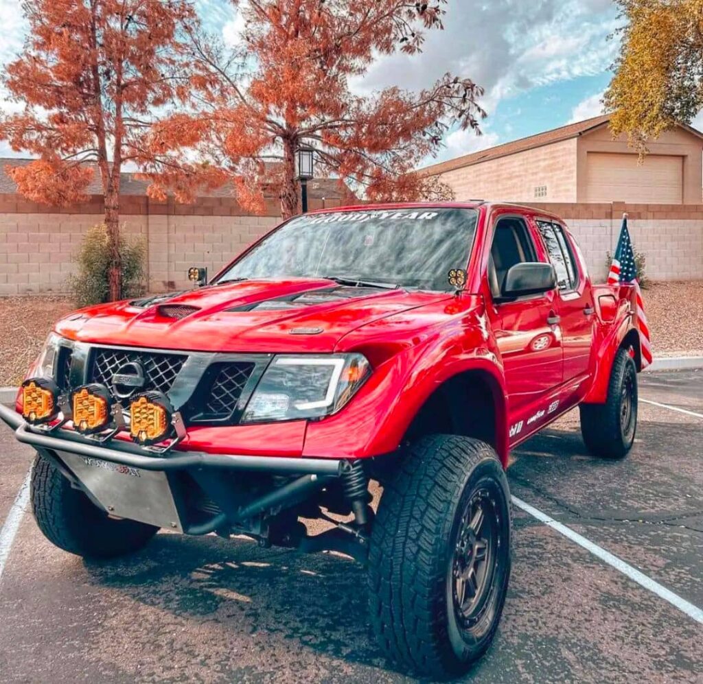 Nissan Frontier with tubular uniball upper control arms, CJD boxed lower control arms, and Radflo coilovers